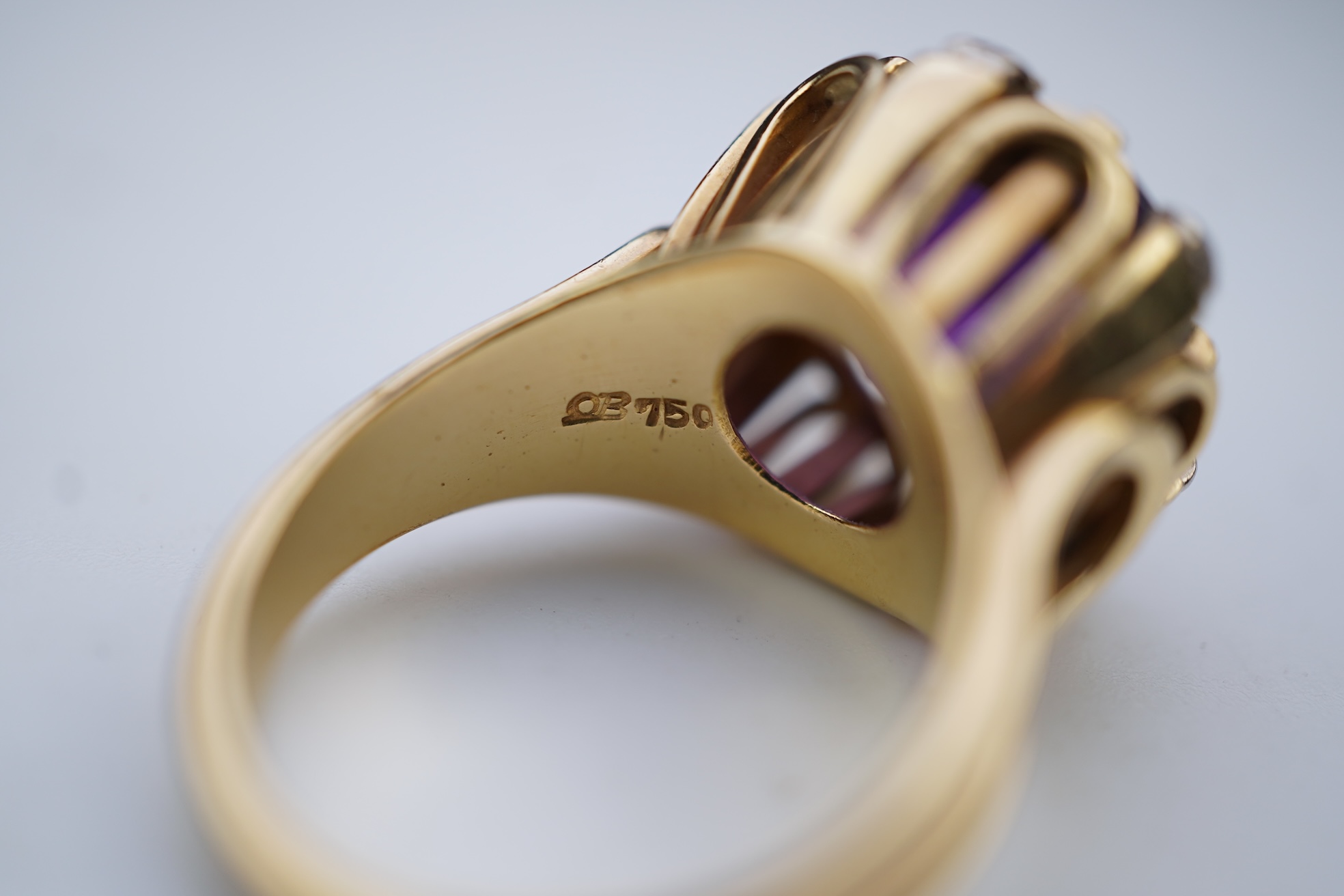A stylish amethyst and diamond ring